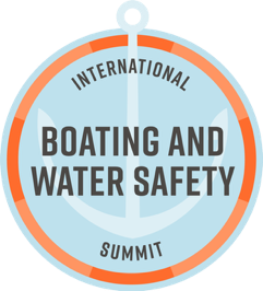 Circular emblem with the text "International Boating and Water Safety Summit" over a light blue background featuring an anchor silhouette.